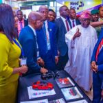 Pres. Tinubu thumbing up for Kia, while Olu Tikolo, VP, Kia Nigeria, and other guests watch…at the official opening ceremony of the 29th NES in Abuja, recentl