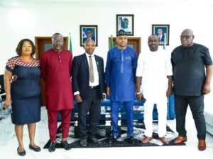 Deputy Governor Hon Peter Odey (3rd from right) in a group photograph with members of the Cross River/Ebonyi Youth Peace Development Movement during a courtesy visit in Calabar