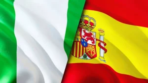 depositphotos_435481914-stock-photo-nigeria-spain-flags-waving-flag