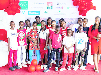 Beneficiaries in a group photograph