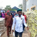 Atu inspecting rice before distribution