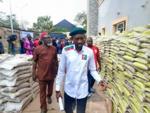 Atu inspecting rice before distribution