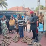 Onunkwo distributing the yam seedlings