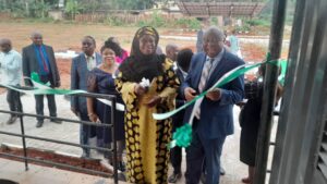 The Minister’s represented, Mrs. Ilyasu cutting the tape of the energy park field.