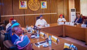 Akume in a meeting