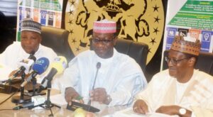 From left: Minister of State for Housing and Urban Development, Abdullahi Tijjani-Gwarzo; Chairman, House Committee on Housing and Habitat, Abdulmiminu Jibrin and Minister of Housing and Urban Development, Ahmed Musa-Dangiwa, during an oversight visit of the Committee to the Ministry in Abuja on Thursday