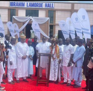 Management of Inter-Atlas Synergy Limited, led by Mr Peter Omoh Dunia, its Executive Director and School Management Board member of Ogbona Secondary School in a group photograph with the family of Late DIG Ibrahim Lamorde, during the commissioning of Ultra modern auditorium named in his honour in Edo State over the weekend