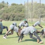 • Coach Waldrum supervises another training session.