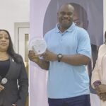 • (Middle)- Former quarter miler, Enefiok Udo-Obong receiving award from Lagos State Athletics Association.