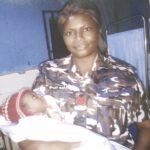 •Inspector Agwu with rescued baby