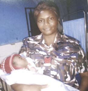 •Inspector Agwu with rescued baby