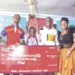 •L-R- Chika Onwuatuogu, a judge; Aderibigbe Emmanuel, the winner; Emeka Onyejiaka, and Catherine Onyejiaka, both judges, at the presentation of mock cheque and trophy to Emmanuel