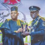 •Shaba being presented the award by Vice President Shettima