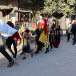 Displaced Palestinians flee in Deir Al-Balah
