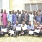Dr. Owolabi flanked by FUTA officals, students and guests photograph