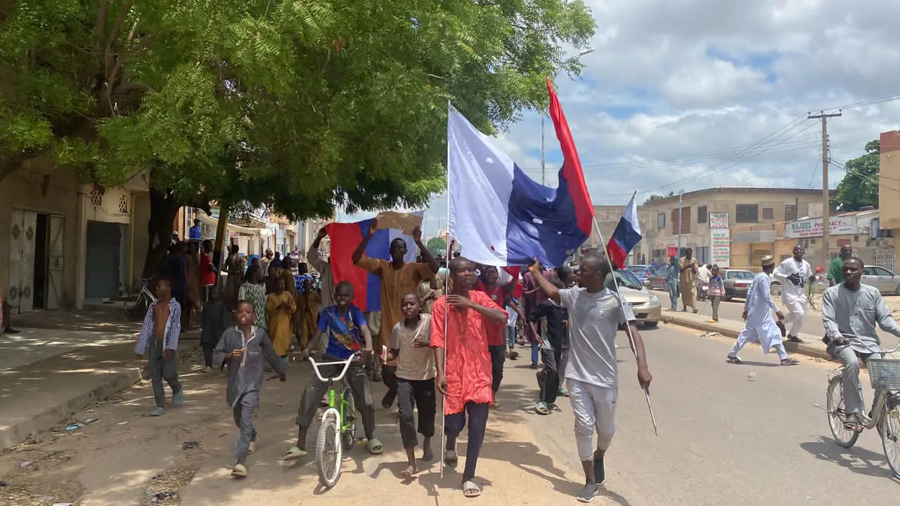 Nigerians with Russian flag
