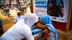 Woman-Receiving-Vaccine-1280-720-1030×579