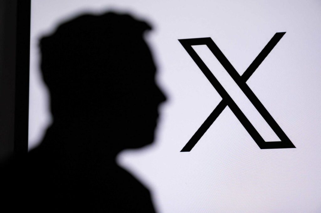 Elon Musk silhouette against X background