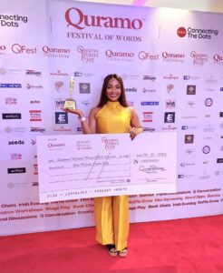 Quramo Writers Prize winner 2023 with manuscript, ‘Dear Zini’, Chiziterem Chijoke displaying her plaque and trophy