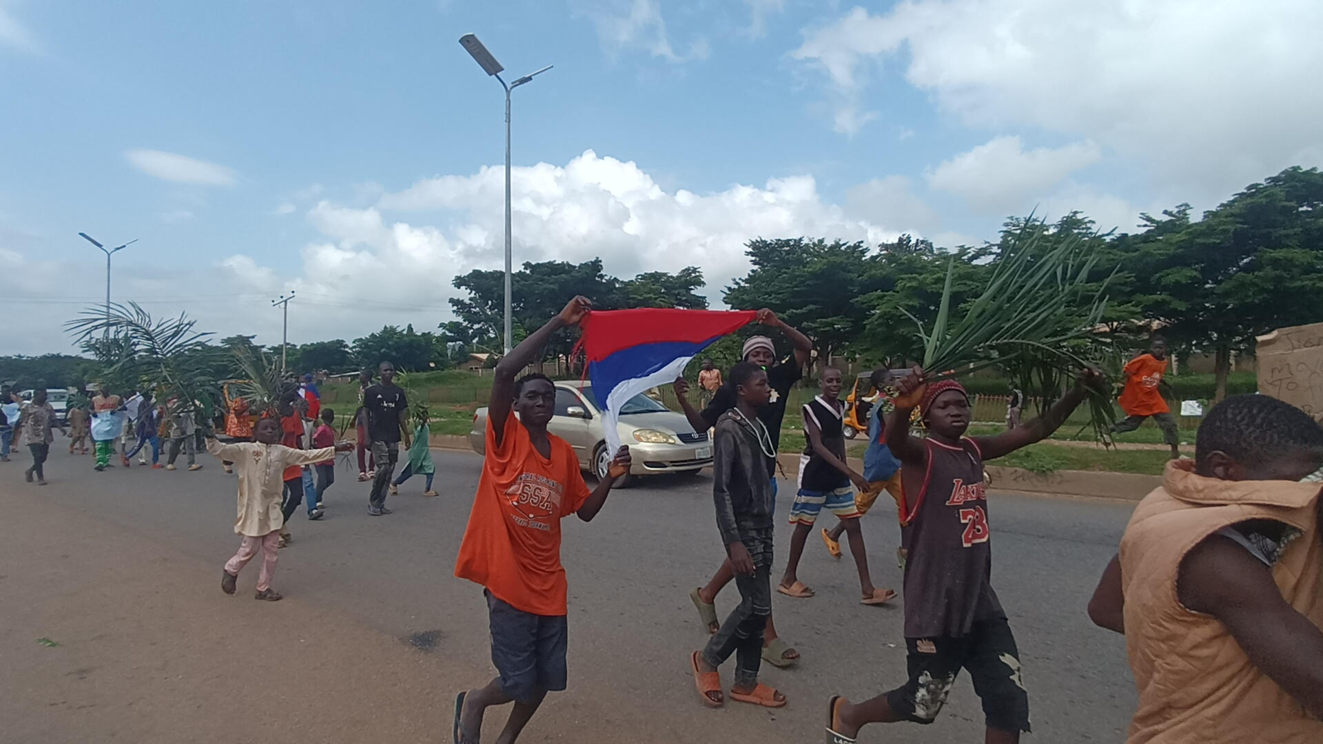 Abuja: Protesters flying Russian flag