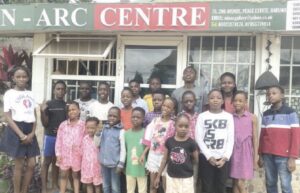 •Cross-session of children artists in front of the gallery