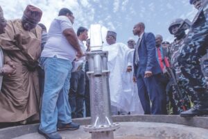 •Idris and Kumar-Kasam launching the borehole in Amanawa village