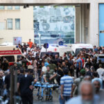 People gather outside a hospital, as more than 1,000 people, including Hezbollah fighters and medics, were wounded on Tuesday when the pagers they use to communicate exploded across Lebanon, according to a security source, in Beirut