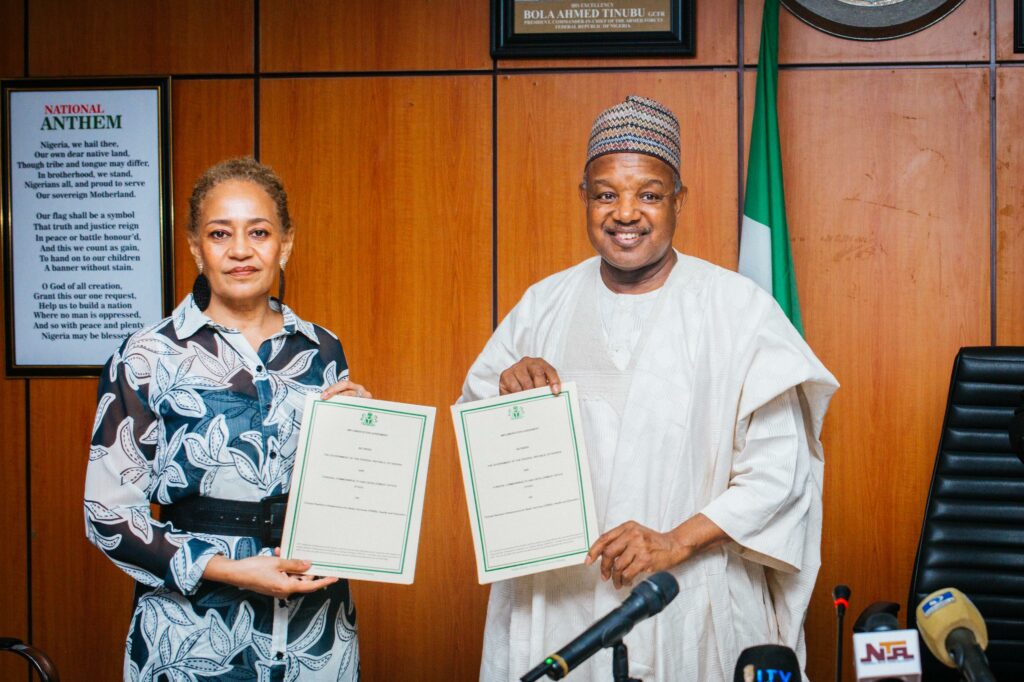 UK Charge d’ Affairs, Ms Cynthia Rowe, and Minister of Budget and Economic Planning, Senator Abubakar Bagudu, during the signing of eight Programme Implementation Agreements between the United Kingdom and Nigeria in Abuja, yesterday.