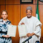 UK Charge d’ Affairs, Ms Cynthia Rowe, and Minister of Budget and Economic Planning, Senator Abubakar Bagudu, during the signing of eight Programme Implementation Agreements between the United Kingdom and Nigeria in Abuja, yesterday.