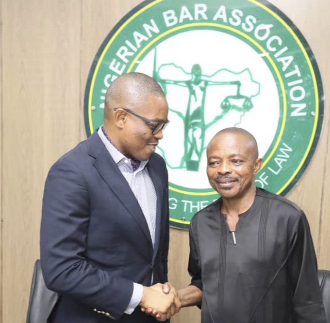 L-R: President, Nigeria Bar Association (NBA), Afam Osigwe, SAN, in a handshake with Nigeria Labour Congress (NLC) president, Joe Ajaero, when the NLC visited the NBA office in Abuja, on Thursday