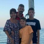 Fabio Chiarioni (2nd L), Daniela Albano (1st L) and their two sons