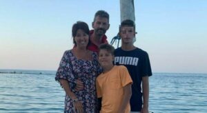 Fabio Chiarioni (2nd L), Daniela Albano (1st L) and their two sons