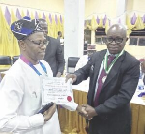 •Eriba receiving the award