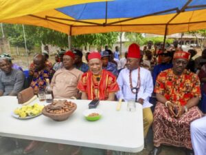 •Ezeji (middle) with community leaders at the event