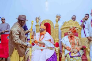 Delta State Governor Rt Hon Sheriff Oborevwori (left) presenting Staff of office to the new Asagba of Asaba, HRM Prof Epiphany Azinge (2nd right), while his Wife, HRM Dr. Valerie Azinge looks on during the ceremony in Asaba on Thursday. Pix Enarusai Bripin