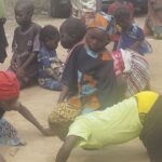 Children of Tungan Ladan, engaging in local game