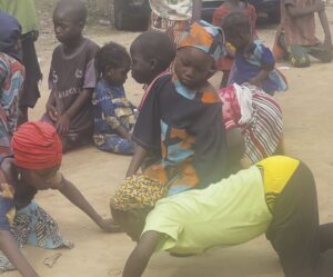 Children of Tungan Ladan, engaging in local game