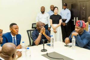 L-R {sitting}: Executive Director of CIG Motors, Mr. Jubril Arogundade; Chairman of the House Committee on Industry, Hon. Enitan Dolapo-Badru; National Automotive Design and Development Council {NADDC}, Mr. Joseph Osanipin, during the tour of CIG Motors’ auto plant in Lagos, by the House of Reps Industry Committee and the NADDC team.