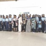 Mrs Lechi Eke with guests and pupils of Air Force Secondary School, Ikeja, during the conference
