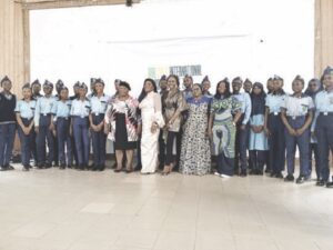 Mrs Lechi Eke with guests and pupils of Air Force Secondary School, Ikeja, during the conference
