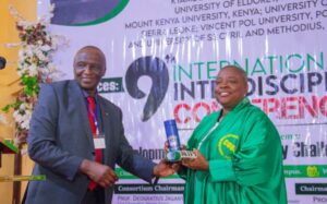 Prof Omenugha during the handover