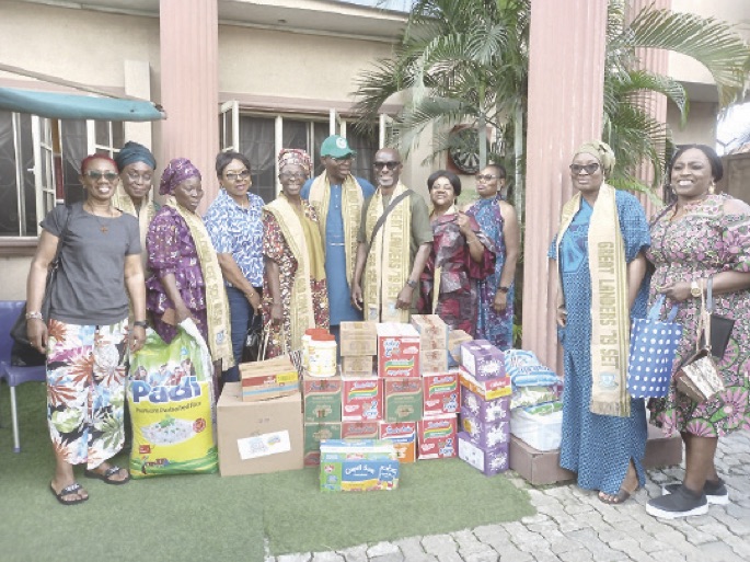 Some members of MCSS alumni at Bales Orphanage, where food items and cash donations were presented to the home