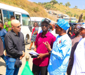 L-R: Head of Engineering SCC Nig Ltd, Ari Arido, Coordinator. Satellite Towns Development Department, Abdulkadir Zulkiflu and FCT Minister Nyesom Wike during the Minister’s inspection of roads in Bwari Area Council on Wednesday