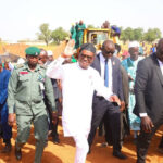 FCT Minister Nyesom Wike acknowledinging greetings from residents of Paikon Kore in Gwagwalada Area Council during his tour of projects on Thursday, November 21st.