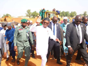 FCT Minister Nyesom Wike acknowledinging greetings from residents of Paikon Kore in Gwagwalada Area Council during his tour of projects on Thursday, November 21st.