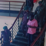 Dele Farotimi in handcuffs