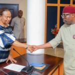 Rivers Governor Siminalayi Fubara (right) in a handshake with the Chairperson of the Judicial Commission of Inquiry into the Arson, Killings and Wanton Destruction of Property in Local Government Councils, Justice Ibiwengi Roseline Minakiri (right); shortly after receiving reports of the commission at Government House in Port Harcourt on Tuesday