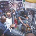 Gov Otti inspecting Roxettes electric car