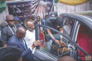 Gov Otti inspecting Roxettes electric car