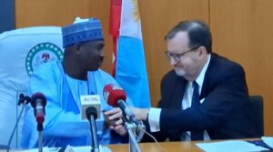Sokoto Governor Ahmed Aliyu (L), US Ambassador Richard Mills Jr (R)
